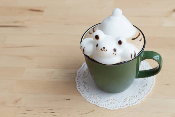 istock Cup of coffee with cute 3D bear latte art 468381900