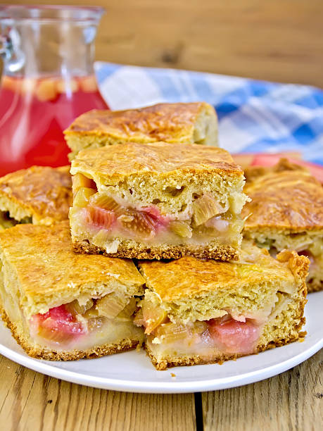 Pie rhubarb in plate and juice on board