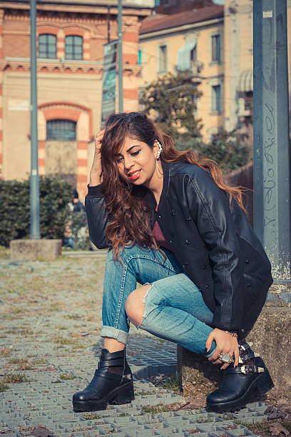 istock Beautiful girl posing in an urban context 468387548