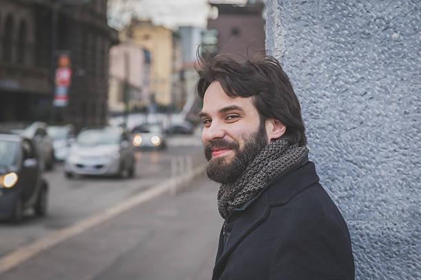 istock Young handsome bearded man posing in the city streets 468389678