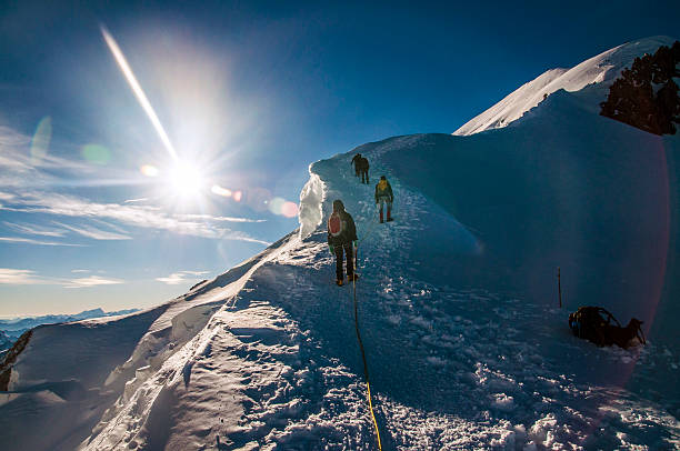 istock climbers climbing Mont Blanc mountain 468392760