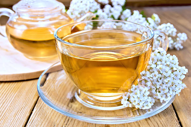 istock Tea with yarrow in cup on board 468393982