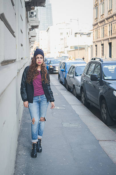 istock Beautiful girl posing in an urban context 468394584