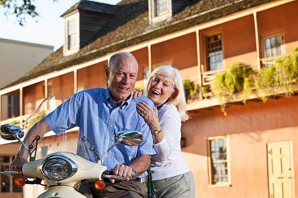 istock Senior couple with motor scooter 468399467