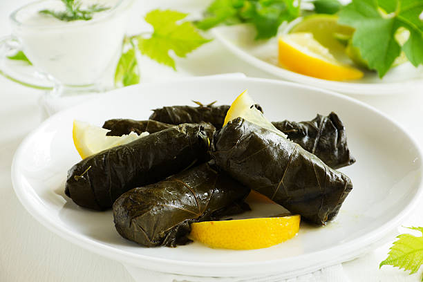 istock dolma, stuffed grape leaves, turkish and greek cuisine 468403354