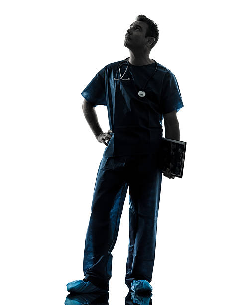 istock doctor man silhouette full length 468403840