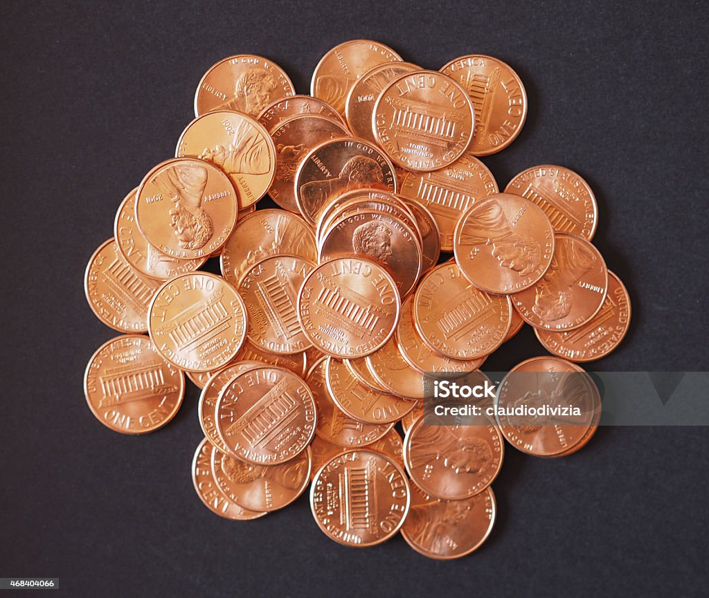 Dollar coins 1 cent wheat penny cent One cent wheat penny coin currency of the United States over black background 2015 Stock Photo
