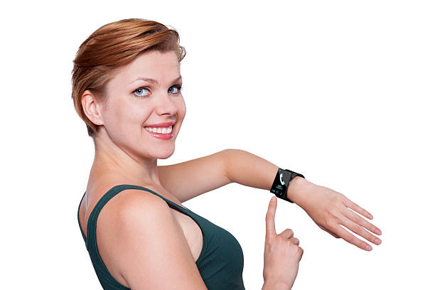 istock Girl with an Internet Smart Watch isolated on white 468404283