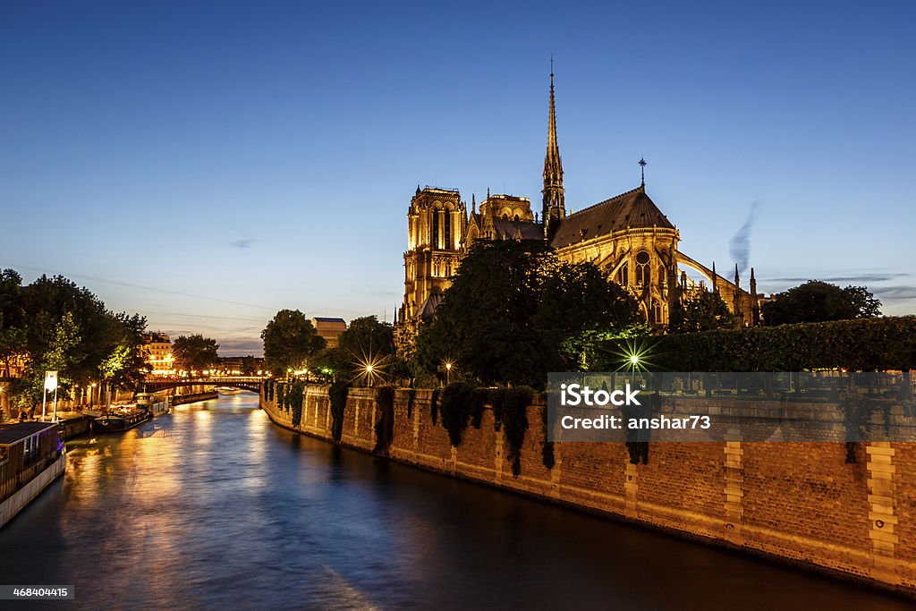 Notre Dame de Paris Cathedral and Seine River Notre Dame de Paris Cathedral and Seine River in the Evening, Paris, France Architecture Stock Photo