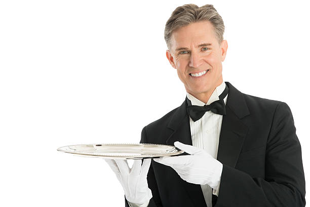 istock Confident Waiter In Tuxedo Holding Serving Tray 468405755