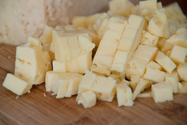 istock Cutting cheese - food ingredients 468410224