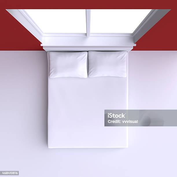 Bed With Pillows And In The Corner Room With Window Stock Photo - Download Image Now