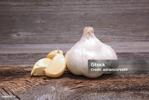 Garlic On Wooden Background Stock Photo - Download Image Now - 2015, Clove - Spice, Eating