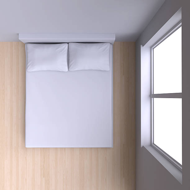 istock Bed with pillows and  in the corner room with window. 468410862