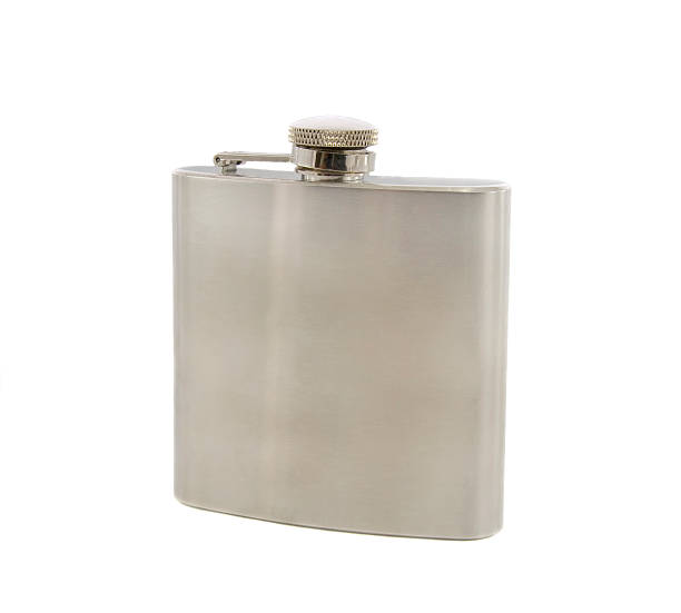 istock Silver flask of brandy isolated over a white background 468411439