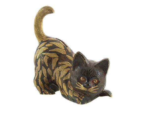 istock Bronze statuette of fun cat isolated over white 468411637