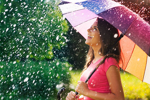 So much fun from summer rain So much fun from summer rain  parasol photos stock pictures, royalty-free photos & images