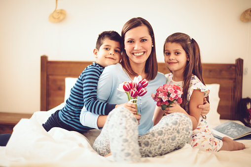 Happy family in the bedroom