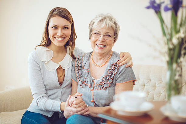 istock Granddaughter is hugging her grandmother 468414196