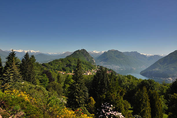 istock Panorama view over an alpine lake 468414527