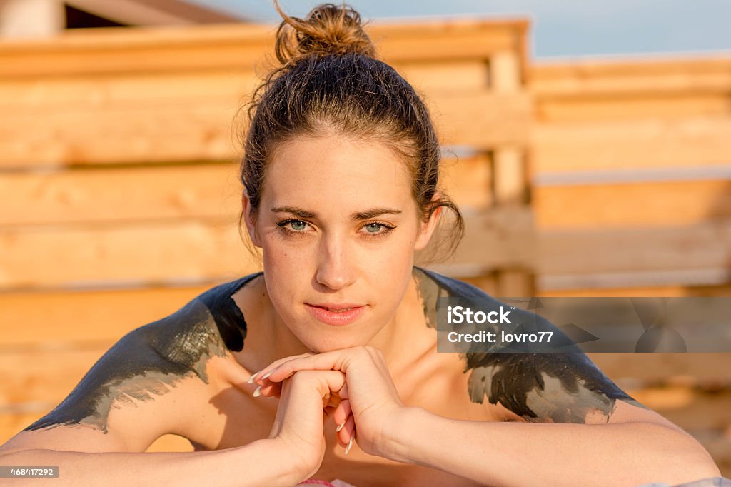 Mud therapy at the spa Woman enjoys the mud therapy at the spa. 2015 Stock Photo