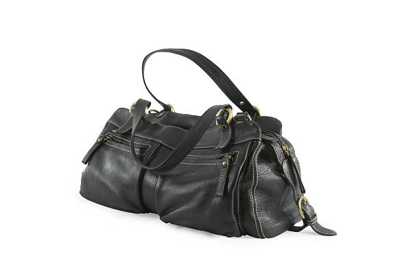 istock Black leather woman bag isolated over white 468418705