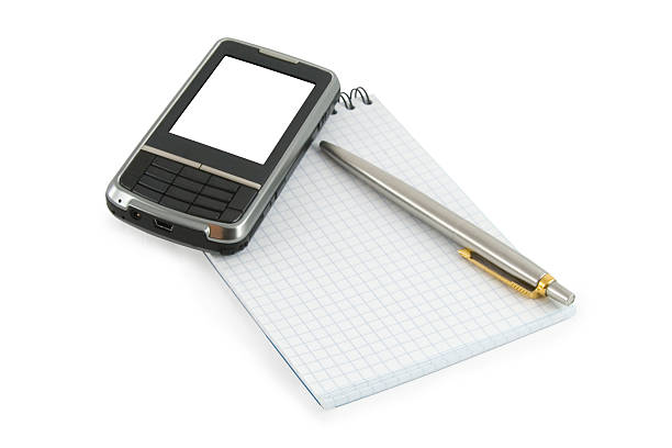 istock Close up notebook, pen and mobile phone on it 468418901