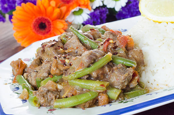 Beef stew with green beans and rice