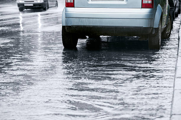 istock Rainy street and car 468419877