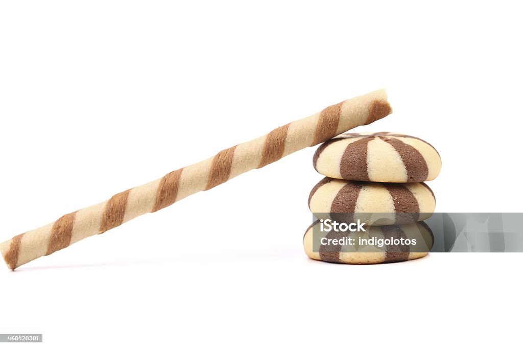 Rayado rollos de oblea de chocolate y juego galletas. - Foto de stock de Alimento libre de derechos