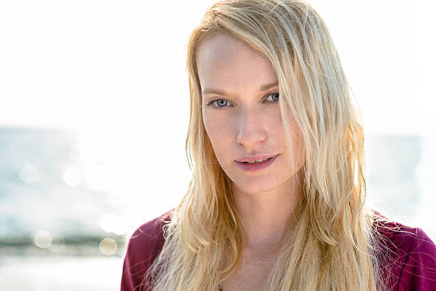 istock Young Woman Portrait at Beach 468420420