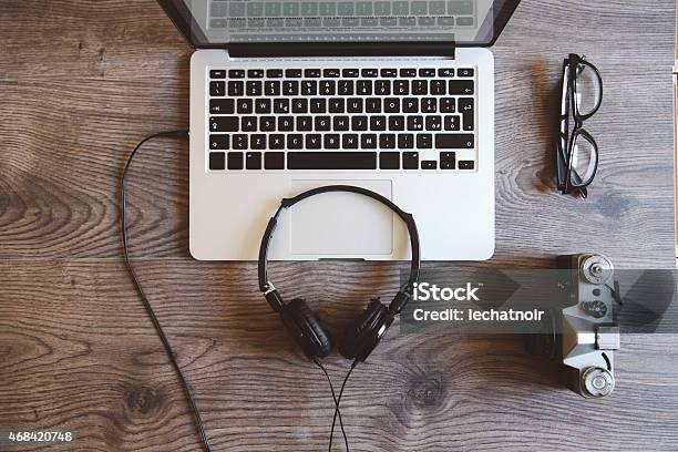 Listening To Music Stock Photo - Download Image Now - Laptop, 2015, Brown