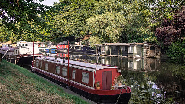 istock Narrow boat barge under the green trees in Cambridge 468420947