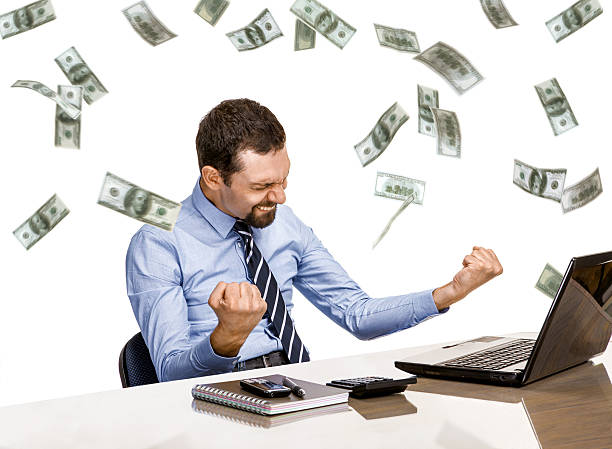 istock young modern businessman excited with his success while 468422201