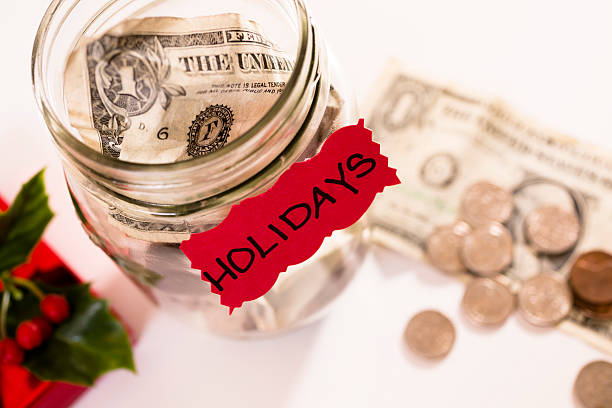 Christmas:  Money Jar with coins, dollar bills.  Saving for Holidays.