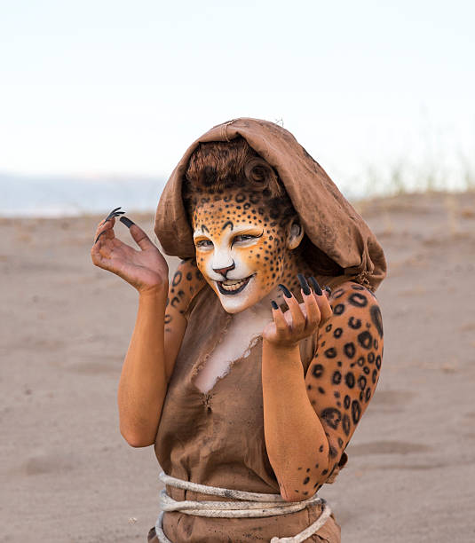 istock Humanoid Cheetah character with long claws looking at camera 468427837
