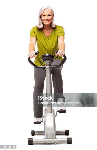 Foto de Fitness Mulher Na Bicicleta Ergométricaisolado e mais fotos de stock de Figura para recortar - Figura para recortar, Bicicleta Ergométrica, Ciclismo