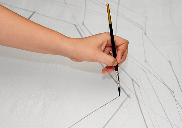 istock Female Hand Painting with a Brush 468428203