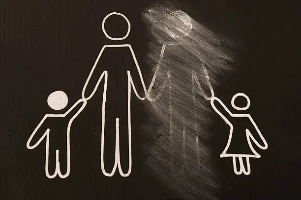 broken family on a blackboard