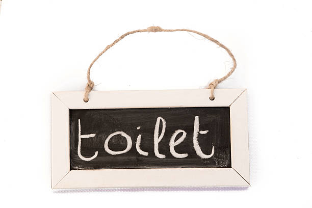 istock blackboard on rope, toilet 468434404