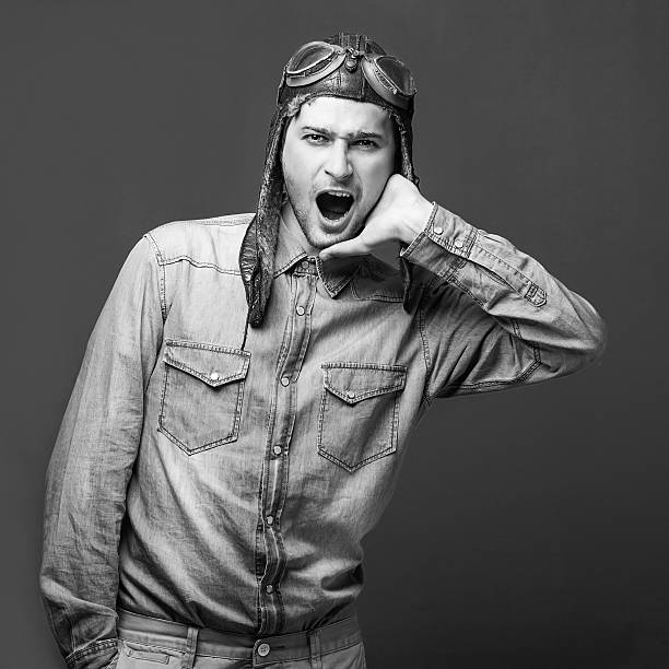 istock fashion male pilot in the studio 468435173