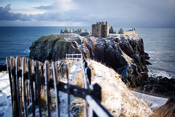 istock Wide View with Gate - Dunnottar Castle, Stonehaven, Scotland UK 468435707