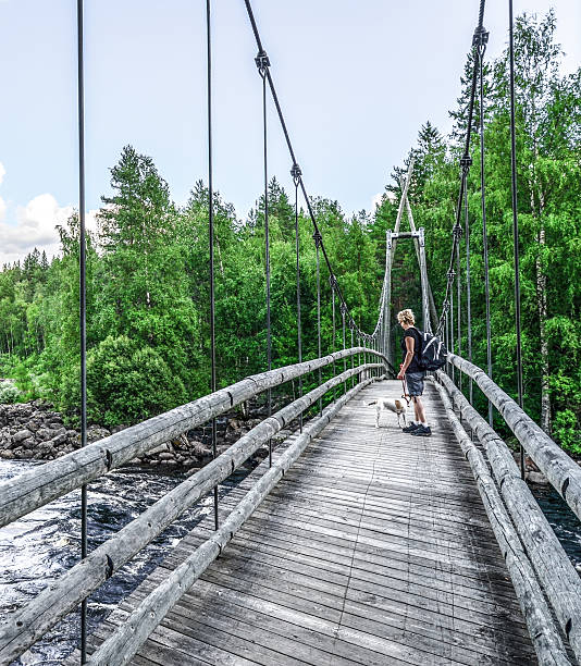 istock Woman on wooden brigde 468435866