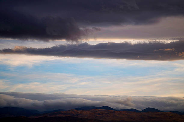 Amazing cloud bank over mountain range. stock photo