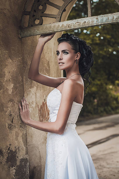 istock Beautiful bride lady in elegant white wedding dress 468439485