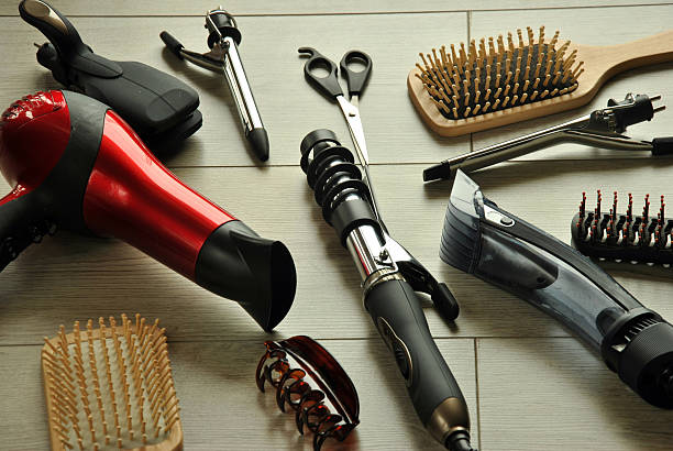 istock hairdressing tools on a wooden floor 468439610
