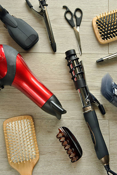 istock hairdressing tools on a wooden floor 468439614