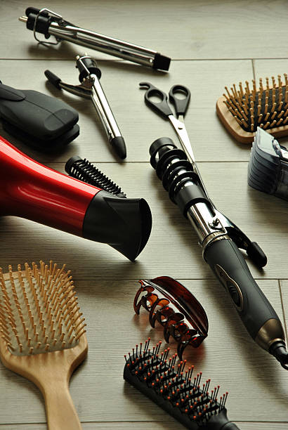 istock hairdressing tools on a wooden floor 468439616