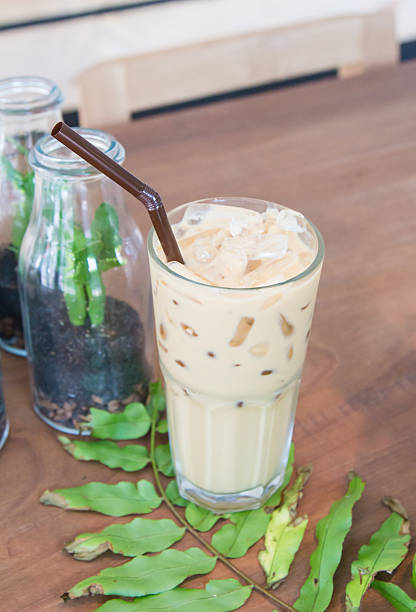 istock Ice coffee on the wooden table 468441854