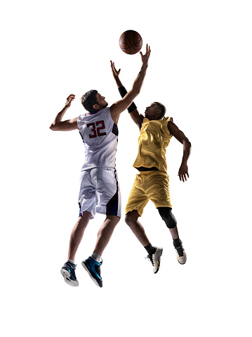 Competitive. Young muscular basketball player in action, motion isolated on white background. Concept of sport, movement, energy and dynamic, healthy lifestyle. Copy space for ad